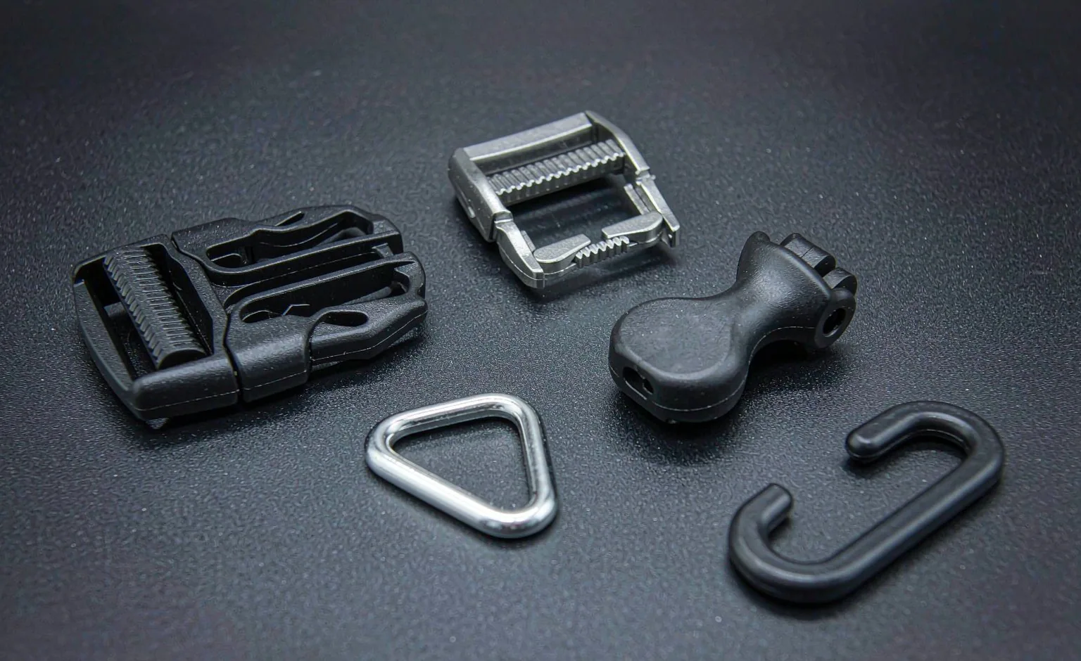 Backpack hardware: side-release buckle, ladder lock, cord lock, D-ring and G-hook