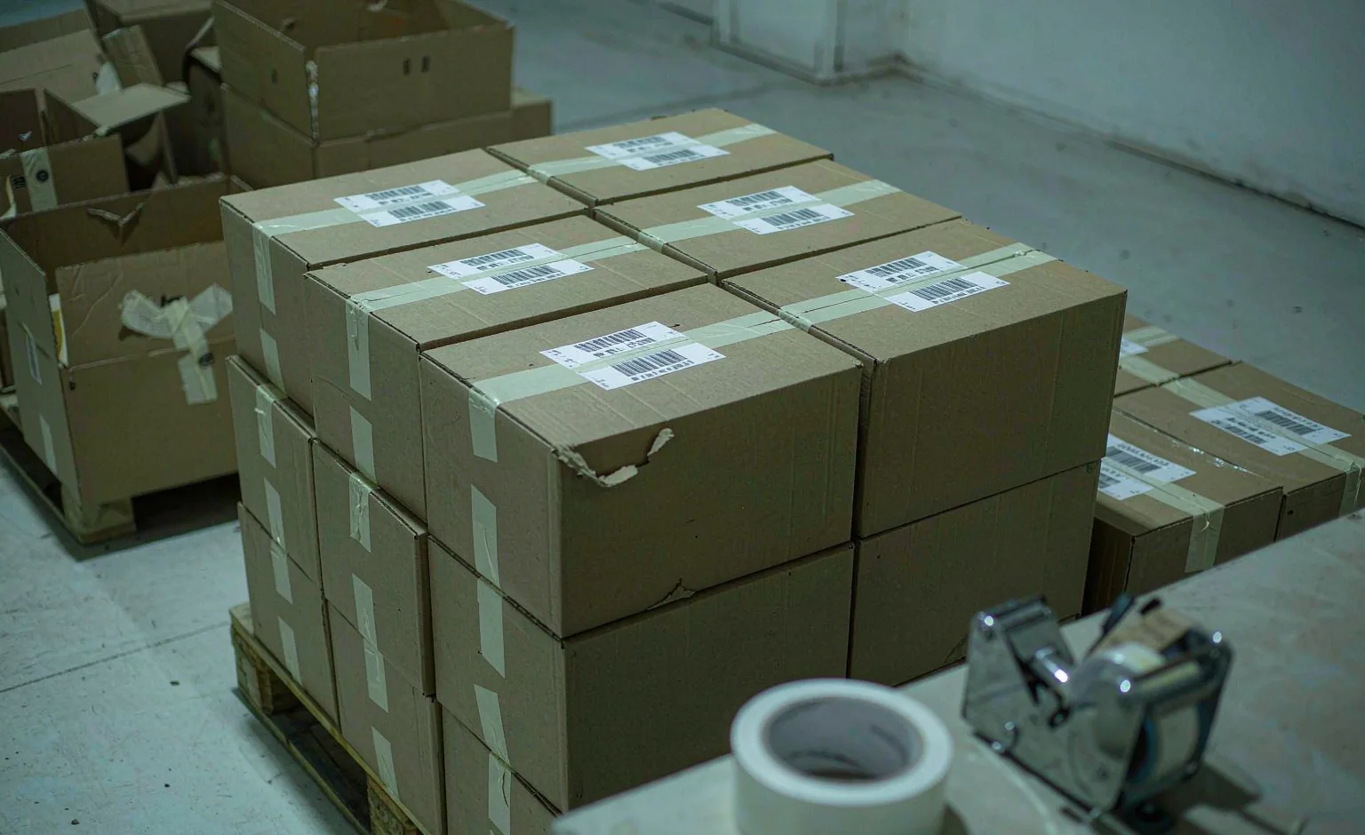 Export cartons stacked on a pallet in a dispatch area