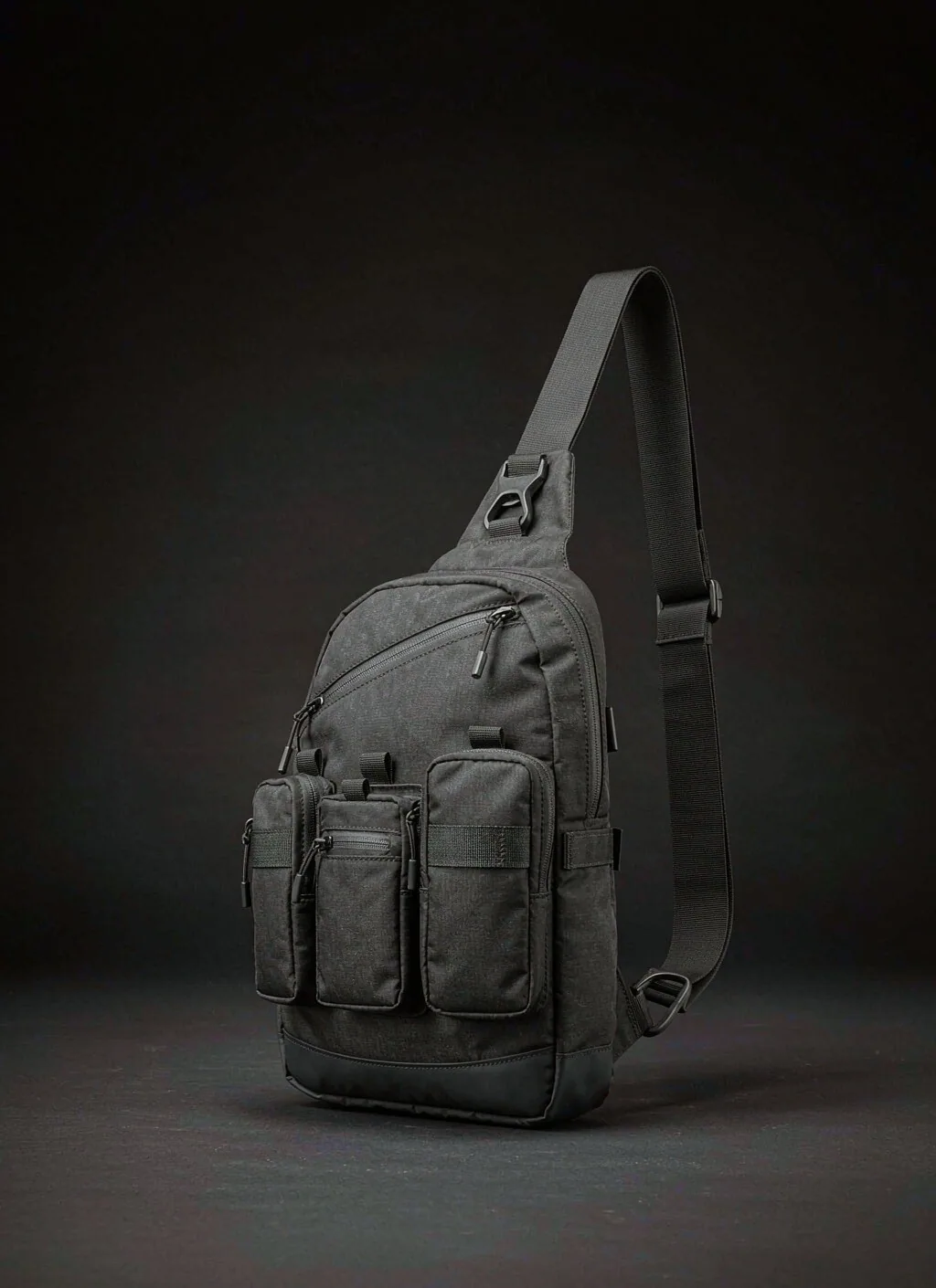 Modular everyday carry pouches laid out on a workbench